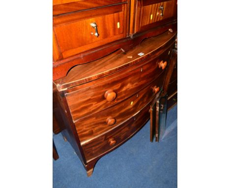 A GEORGIAN MAHOGANY AND INLAID BOW FRONT CHEST of three long drawers, with turned bracket feet, approximate size width 92cm x