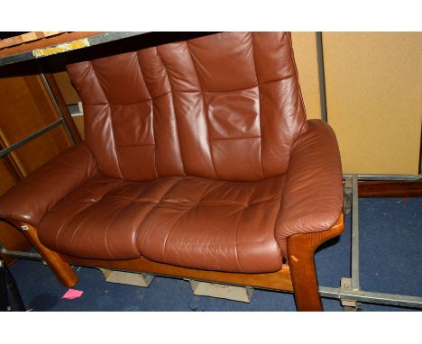 AN EKORNES TWO SEATER BROWN LEATHER SOFA
