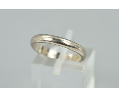A BAND RING of plain D shape design, personal engraving to the inner band, ring size J 1/2, (but the shank is mis shapen), un