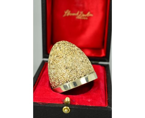 A STUART DEVLIN SILVER EGG LID ONLY, WITH MAKER'S CASE, the half egg with textured scrolling and gilt finish, hallmark for Lo