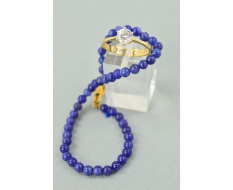 A RING AND GEM BRACELET, the ring designed as a circular cubic zirconia within a six claw setting, with three small cubic zir