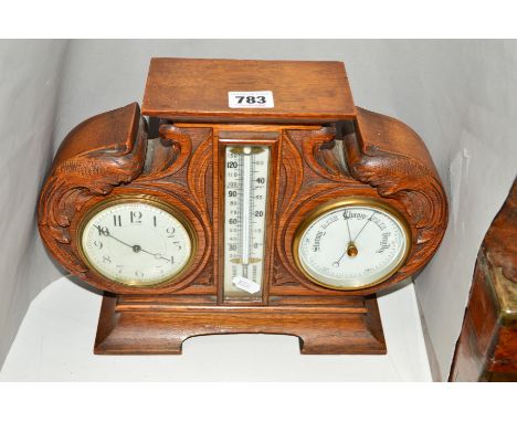 A LATE 19TH/EARLY 20TH CENTURY CLOCK, thermometer barometer set in a carved oak frame with splayed feet base, approximate hei