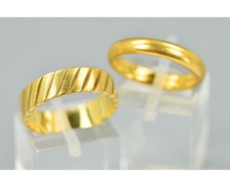 TWO WEDDING BAND RINGS, the first a plain D shape 22ct gold band, hallmark rubbed, ring size O, weight 6.4 grams, the second 