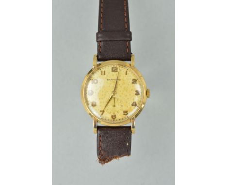 A 9CT GOLD MID 20TH CENTURY GENTS GARRARD WRISTWATCH, round case measuring approximately 34mm in diameter, champagne dial (ve