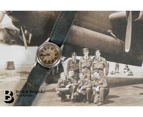 1942 Solar Aqua (Rolex) gentleman's wrist watch. The watch having a circular 28mm cream face with Arabic numerals on a grey p