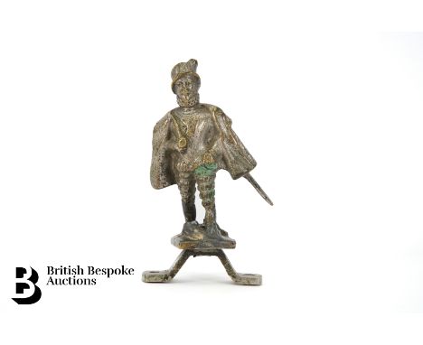 An early 1920s Sir Walter Raleigh nickel plated brass Raleigh Motorcycle handle bar mascot on original mounting bracket, circ