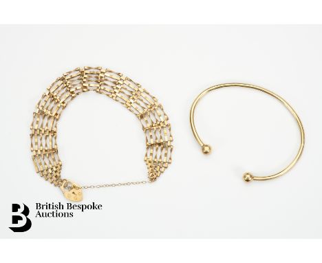A 9ct gold bangle, together with a 9ct gold gate-link bracelet, approx 10.6 gms.&nbsp;