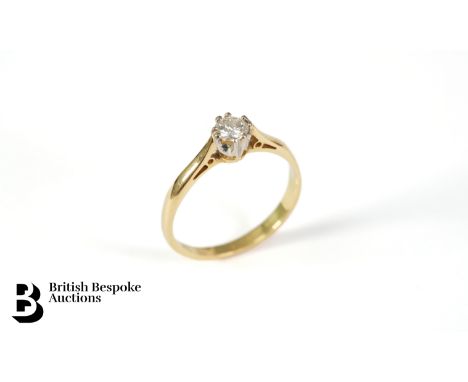 A vintage 18ct yellow gold and platinum solitaire diamond ring, set with an 18 pt diamond, size J, 1.9 gms.&nbsp;
