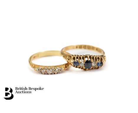 Antique 18ct yellow gold sapphire ring. The circular center sapphire measuring 2.5 mm, size P, together with an antique four 
