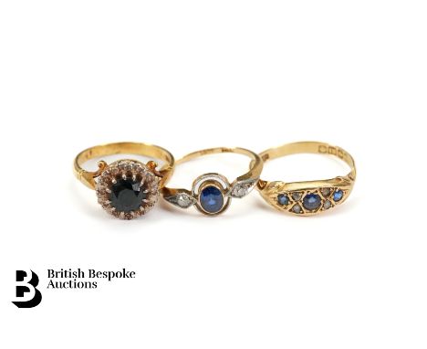 18ct sapphire and diamond boat ring. The ring set with three sapphires (af), size P, together with an 18ct gold sapphire and 