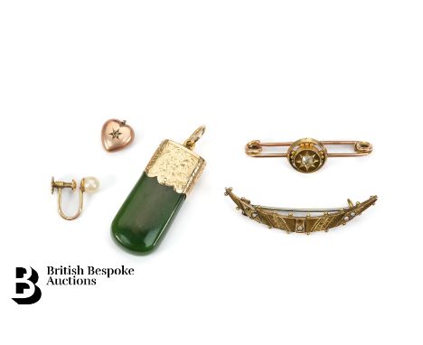 An Edwardian 9ct gold diamond bar brooch, approx 40mm set with a rose cut diamond, approx 2.4 gms with 9ct gold crescent broo