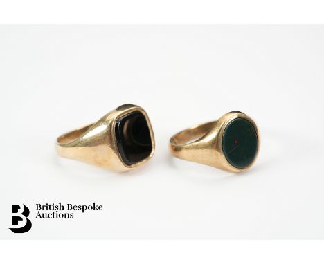 9ct yellow gold black onyx signet ring, size R together with another 9ct gold signet ring, size Q, approx 9.4 gms.&nbsp;