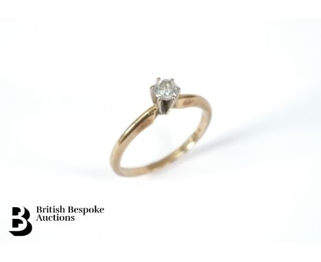 A 14ct yellow gold and diamond solitaire ring. The ring set with a 20 pts diamond, size L, approx 2 gms.&nbsp;