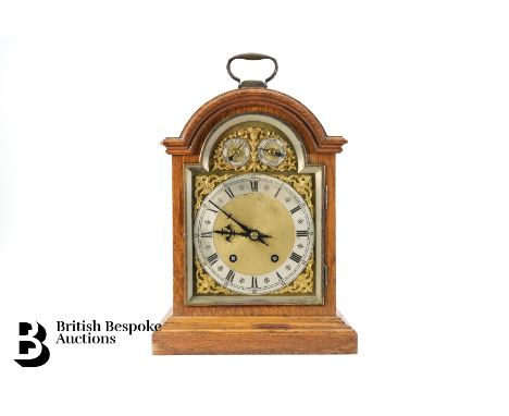 Winterhalder & Hofmeier quarter chiming bracket clock, having a 6" dial with foliate spandrels and silvered chapter, Roman ho