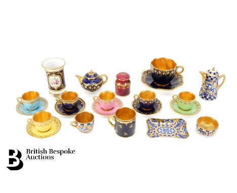 Miniature Coalport tea ware, including lime green, pink, turquoise, cobalt blue (af) and yellow cups and saucers with fine gi