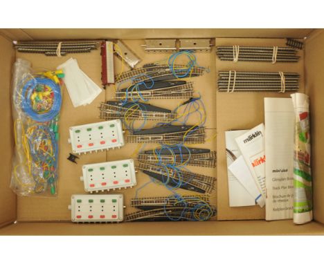 Marklin Z Gauge Points, Track etc. - Group of eight Points, some bundles of sectional track, point switches and wire feeds. C