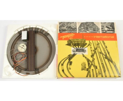 Fleischmann HO Gauge 1780/6018 Electrically Operated Turntable complete with Switch. Conditions are Good to Excellent (unchec