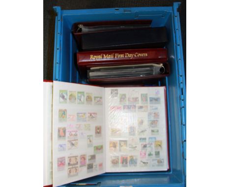 A large quantity of first day covers and stamp albums.
