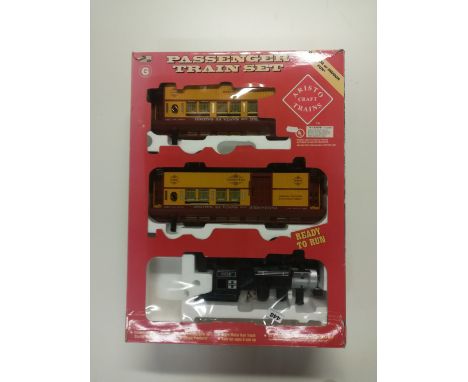 An Aristo 1:20.3 locomotive and two carriages.