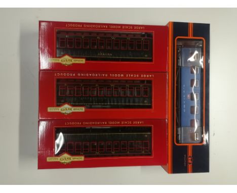 Three boxed Bachmann 1:20.3 passenger cars, two items n. 89298 and n. 89294, together with a further Train passenger car.