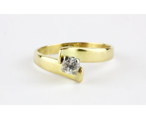An 18ct yellow gold (stamped 18ct) brilliant cut diamond set solitaire ring, (K).
