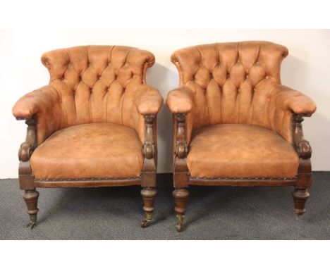 A pair of 19th Century button backed upholstered, H. 74cm (missing two casters).