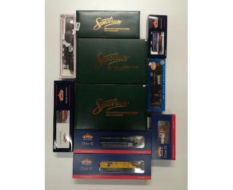 Seven Bachmann 00 gauge locomotives and three boxes of Bachmann spectrum rolling stock.