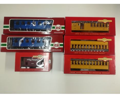 Six Bachmann 1:20.3 items of rolling stock.