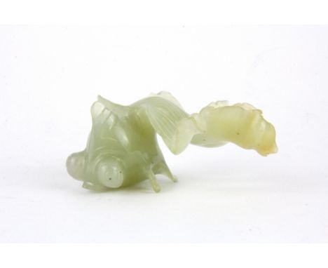 A Chinese carved jade/hardstone fantail fish (small repair to front fin), size 7 x 4cm.