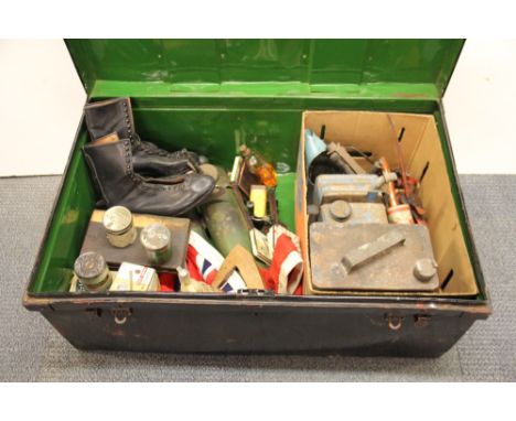 An old military cabin trunk containing a pair of ice skates, old tools, tins and other mixed items, size of trunk 90 x 56 x  