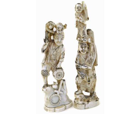 Two Japanese ivory carved figures,Condition report: Lefthand figure: 19cm high, the monkey's foot is chipped off. Right hand 