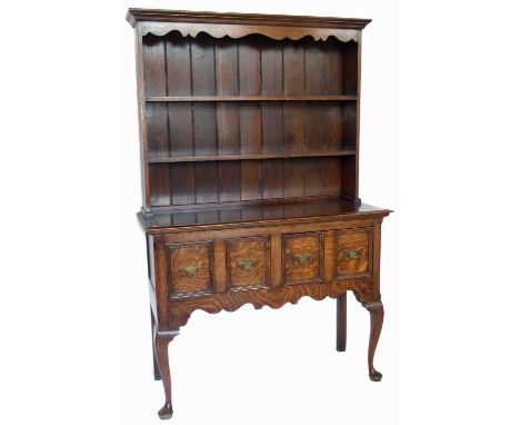 Mid 20th century oak dresser, two shelf rack base with two drawers standing on cabriole foreleg supports.Width 114cm (45"), D