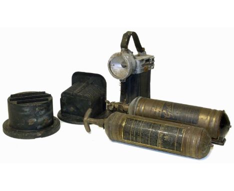 Oldham "Toucan" roadside lamp, two WWII blackout headlamp covers, two Merry Weather fire extinguishers.