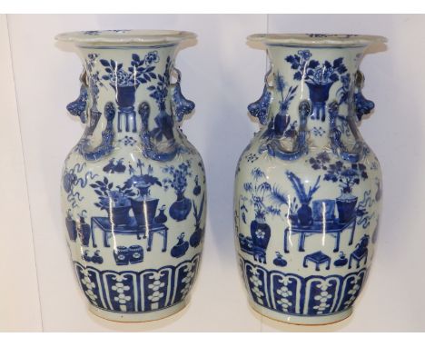 A pair of 19thC Chinese blue &amp; white porcelain vases,  the flared rims onto shouldered bodies, each applied with a small 