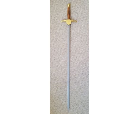 A 20thC commemorative Wilkinson sword with brass hilt.