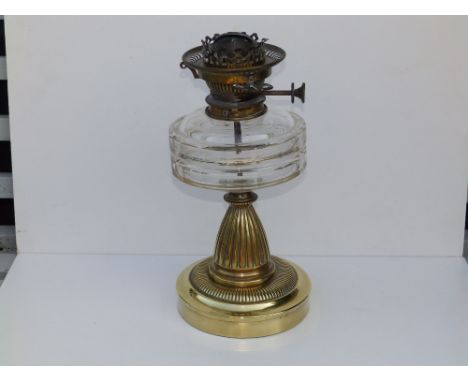 A Victorian brass oil lamp with cut glass reservoir - No2. Hinks Patent, 13" high.