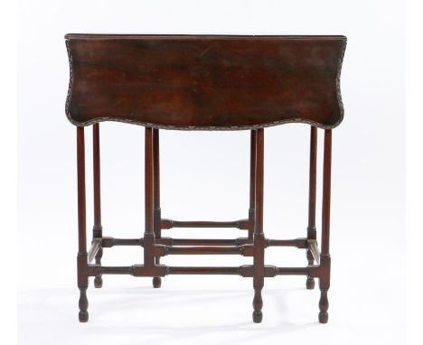 George III mahogany drop leaf table, with shaped leaves with leaf and scroll edge above slender gate legs base, 66cm wide x 7