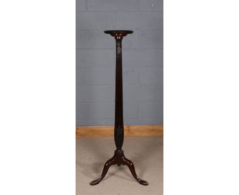 Victorian style mahogany torchere stand, the circular platform with reeded column raised on three shaped tripod legs, 143cm h