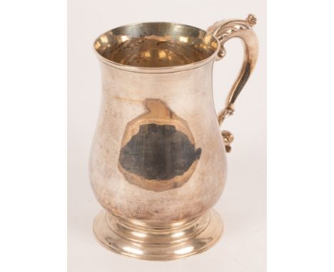 A George III silver tankard, William Collings, London 1775, of plain form on a circular base, 13.5cm high, approximately 405g