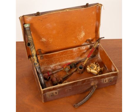 A 19th Century Chinese opium pipe, jade capped and brass mounted, missing the mouthpiece, 33.5cm long and others (6)  CONDITI