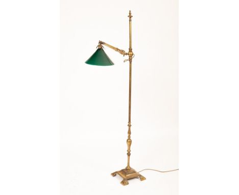 A brass floor standing reading light, with green glass shade, 159cm high  CONDITION REPORT: Mid 20th century. Overall good co