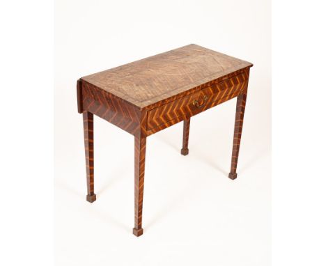 A George III Scottish laburnum bedroom table, the rectangular top with a small drop leaf to the rear, fitted a frieze drawer 