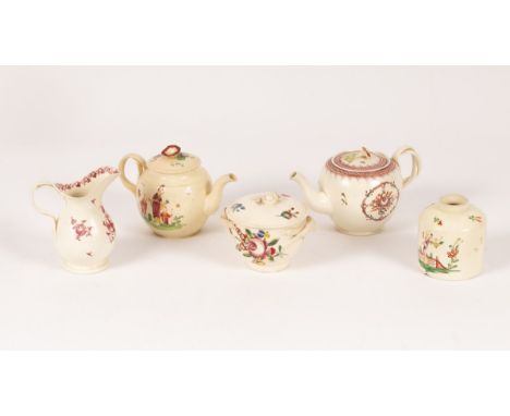 A group of 18th Century polychrome decorated creamware, comprising: a sugar bowl and cover, globular teapot and cover, helmet