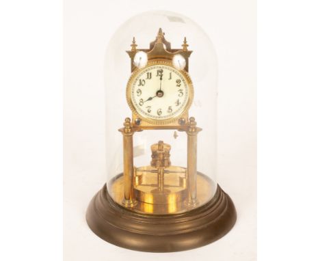 A gilt brass cased mantel clock with cream enamel dial, fitted an eight-day movement with oscillating pendulum, on a circular