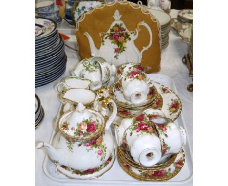 A Royal Albert Old Country Rose tea set, 25 pieces, 6 setting, including teapot and stand and tea cosy; 4 Foley "Broadway" co