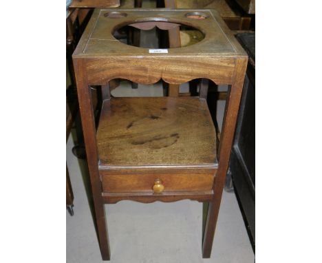 A Georgian mahogany square washstand with hole for basin and 2 small holes to the top, drawer to undertier, on square chamfer