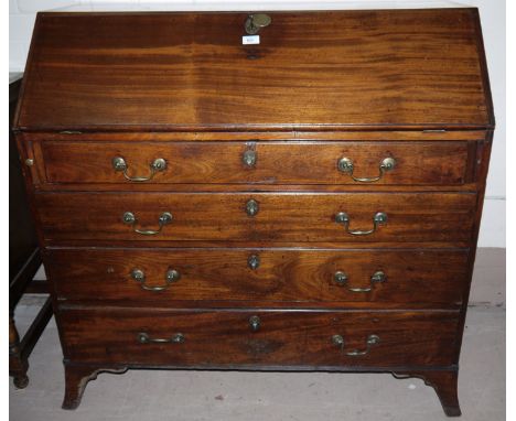 A Georgian mahogany fall front bureau with fitted interior, 4 drawers with swan neck handles, on splay bracket legs, width 42