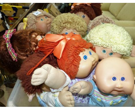 A collection of cabbage patch dolls