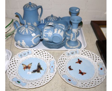 A Wedgwood light blue Jasperware 22 piece tea set including tea and coffee pots; a pair of Jasperware candlesticks; a pair of