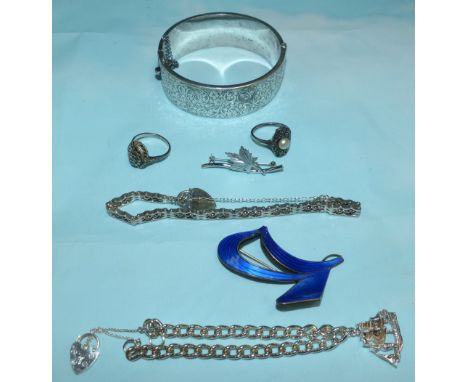A hallmarked silver bangle; a Scandinavian blue enamel brooch; white metal jewellery